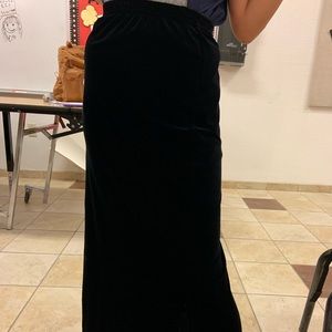 This Girl Identity black skirt is sized Youth 14-16.